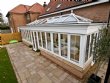 A white Oranery spanning the whole width of the house